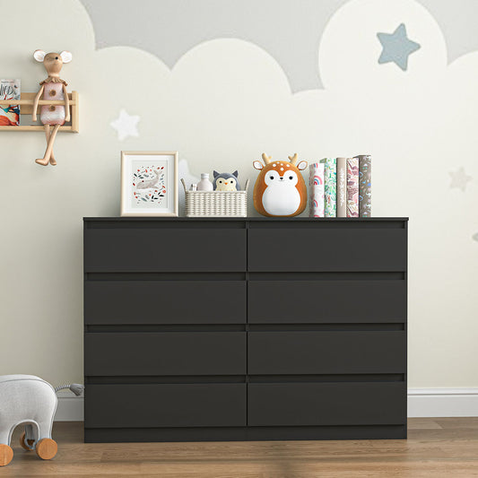 Black wide dresser styled with a mirror and accessories