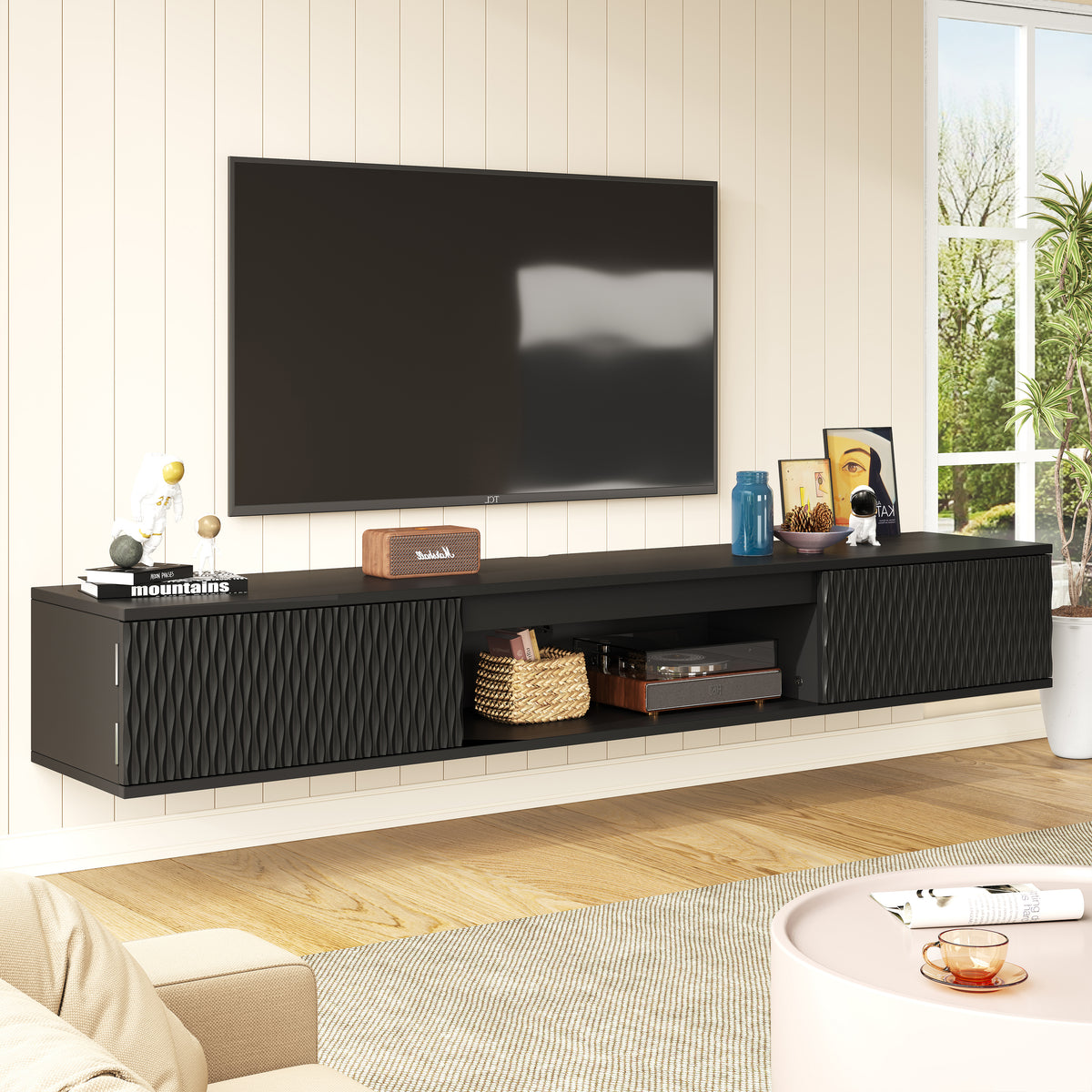 Front view of black wall-mounted TV console