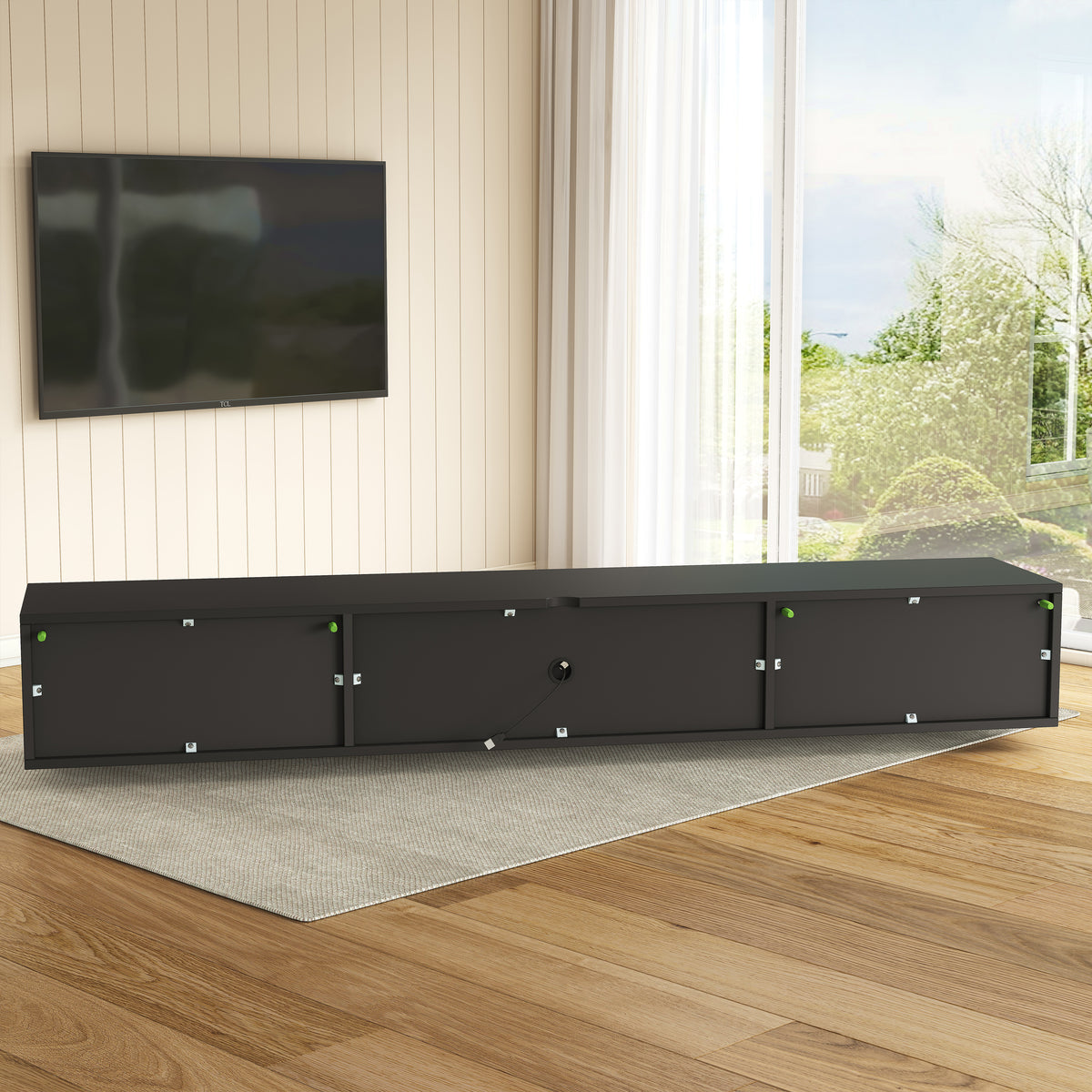 Rear cable-management openings on floating TV console