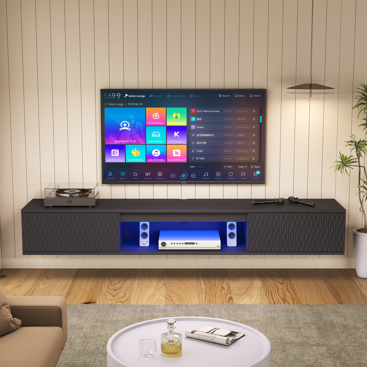 Black floating TV console with RGB LED lighting illuminated