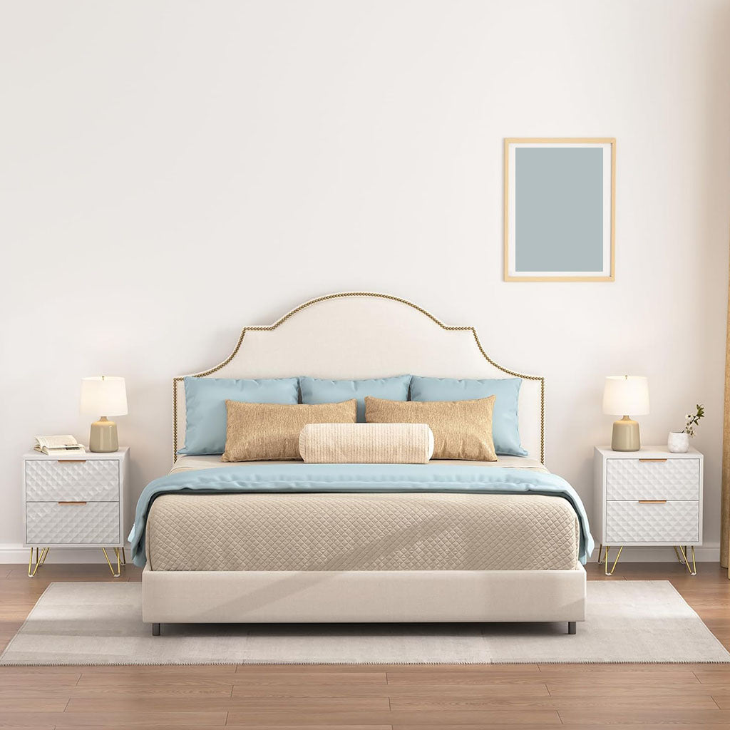 Pair of white geometric nightstands in a bedroom