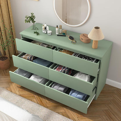 Green dresser with storage drawers open