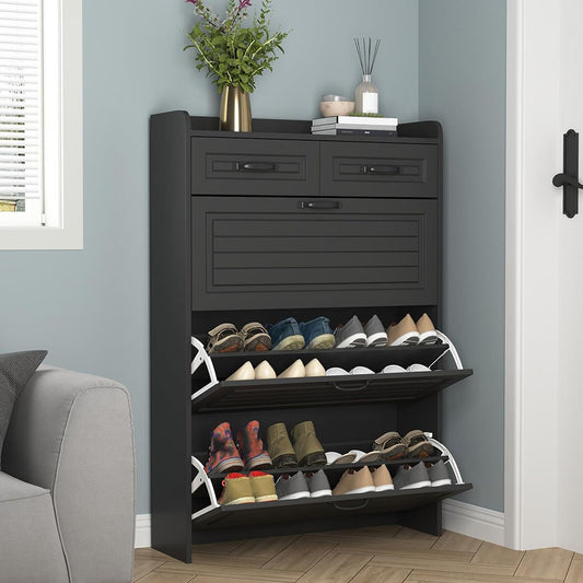 Black shoe cabinet with flip drawers open in an entryway